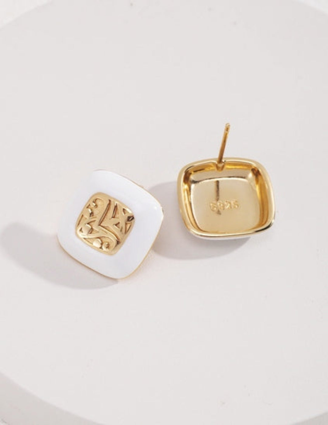 White enamel and gold square earrings