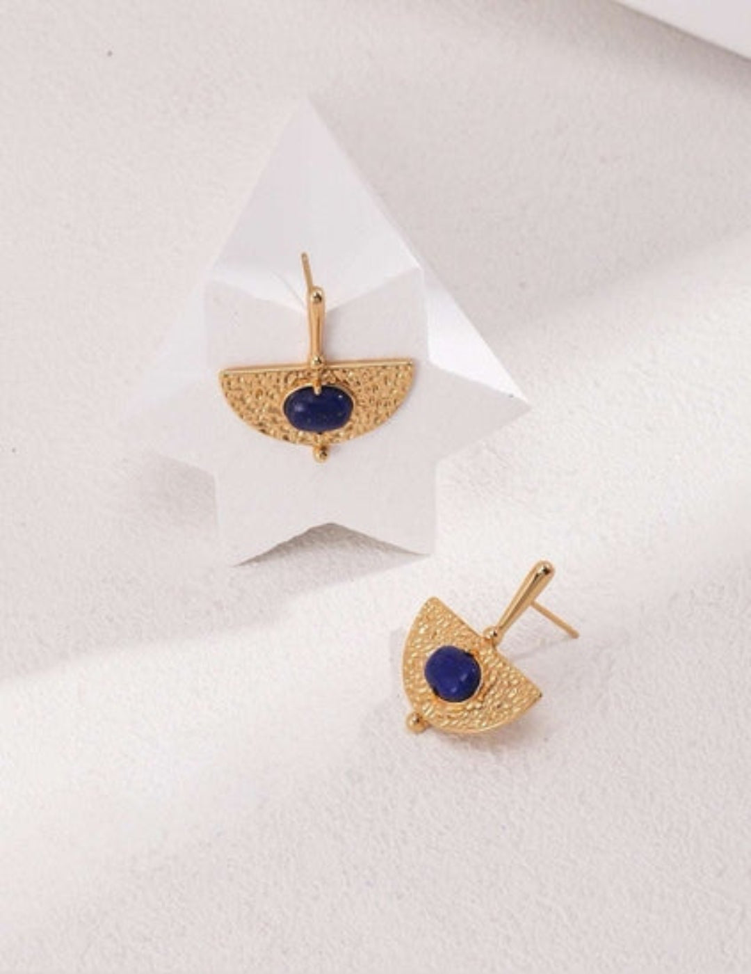 Close-up of natural Lapis Lazuli earrings