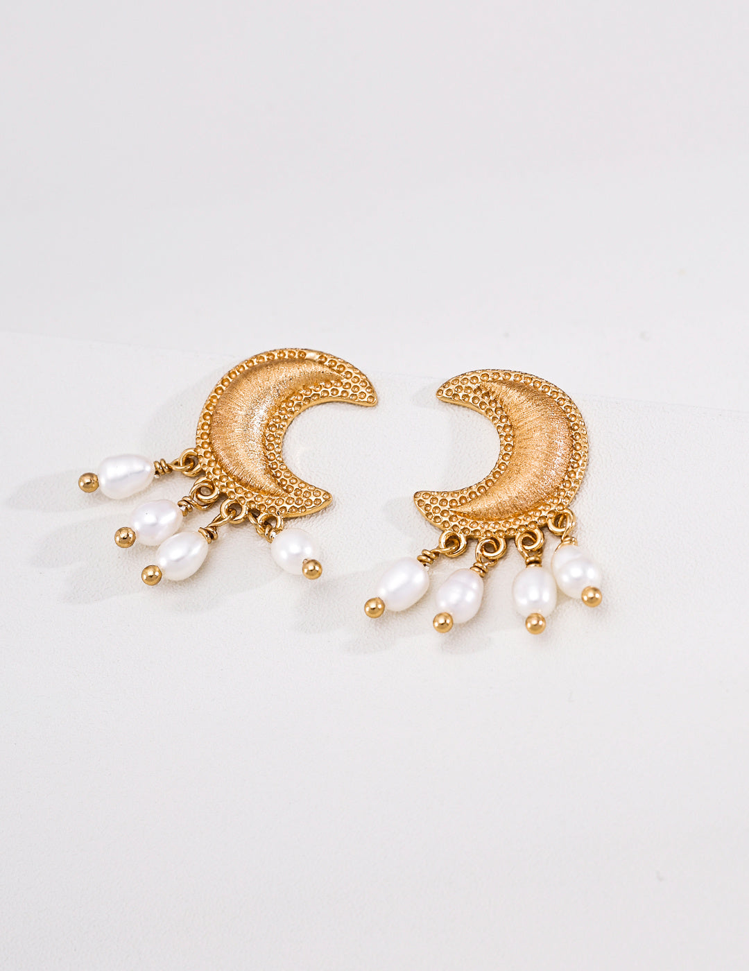 Vintage gold crescent moon earrings in 925 sterling silver with natural pearl drops