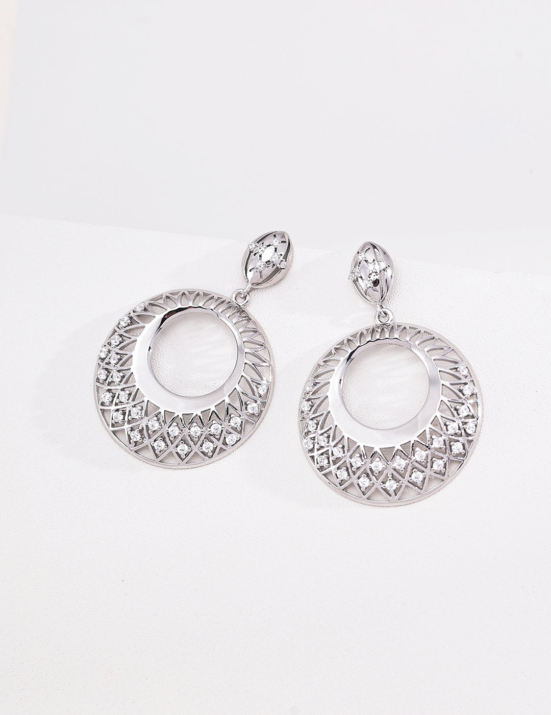 Silver filigree circle drop earrings in 925 sterling silver with cubic zirconia accents