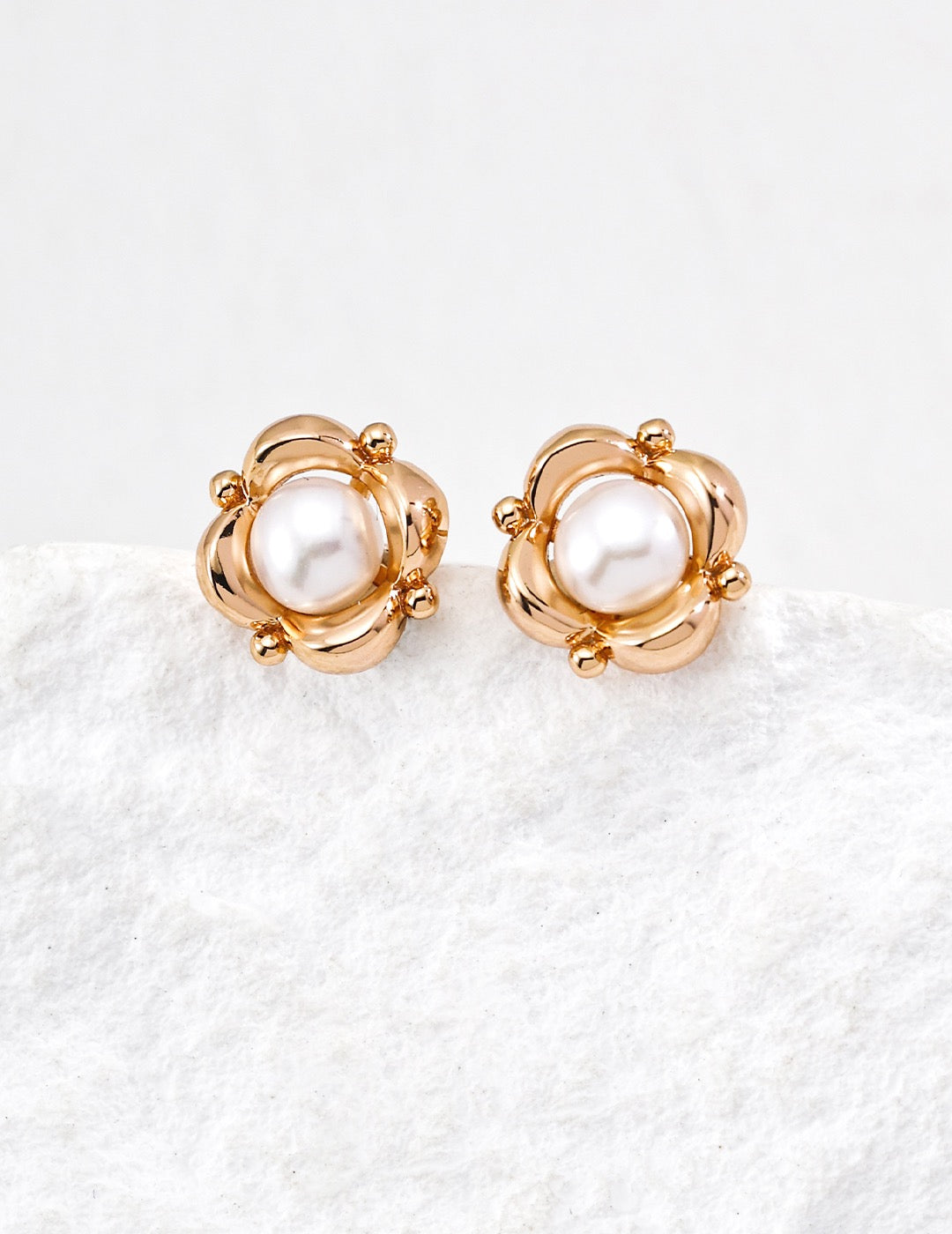 Vintage gold pearl flower stud earrings with polished petals in 925 sterling silver